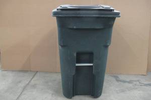 lot 82 image: Toter 64 Gal. Greenstone Trash Can with Wheels and Attached Lid