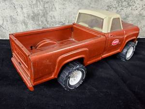 lot 124 image: Awesome 1970s Tonka Metal Pressed Pickup Truck