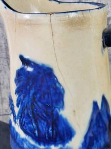 lot 181 image: Vintage Sleepy Eye Indian & Mountain 8.75 Pitcher with Crazing