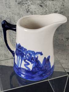 lot 183 image: Vintage Sleepy Eye Indian & Mountain 8.75 Pitcher with Crazing