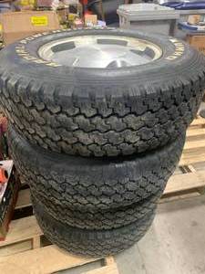 lot 19 image: Kumo LT245 75R16 Tire And Rims (off a 96 Chevy K1500)