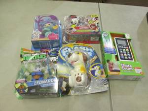 5 Assorted Toys...