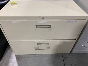 CREAM COLORED METAL FILE CABINET