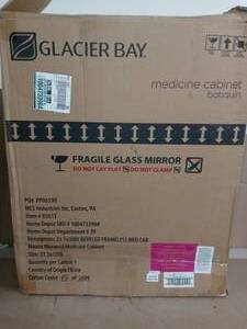 lot 11 image: 23-58 in. x 30 in. Recessed or Surface Mount Beveled Frameless Medicine Cabinet by Glacier Bay- open box not used