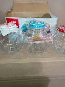 lot 17 image: Cottage Chic 3-Piece Wire Bail and Trigger Closure Glass Jar Set by General Store- open box not used