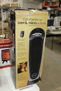 lot 65 image: Lasko Ceramic Tower Heater 1500W with Remote Control (in box)