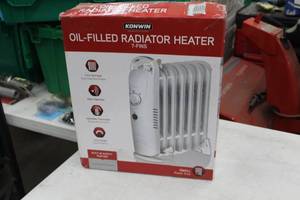lot 64 image: Konwin Oil-Filled Radiator Heater 7-fin (in box)