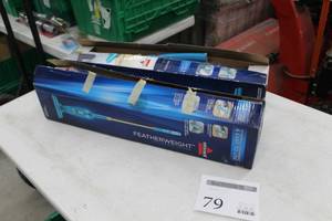lot 79 image: Lot of (2) Bissell Featherweight Lightweight Vacuums (in box)
