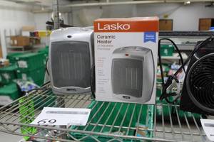 lot 69 image: Lot of (2) Lasko Ceramic Heater 1500W with Adjustable Thermostat (one in box)