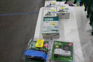 lot 142 image: Lot of (6) Lawn and Garden Supplies (in package) - Ace Single Dial Water Timer, Ace Programmable Water Timer, RainJet Sprinker Timer, Lawn Genie 1 Valves (x3)