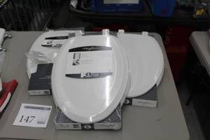 lot 147 image: Lot of (3) Mayfair Enameled Wood Elongated Toilet Seats (in package)