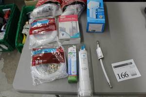 lot 166 image: Lot of Refrigerator Accessories (in package) - Icemaker Installation Kits, Filter Kits, Icemaker Box