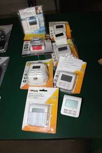 lot 195 image: Lot of (9) Woods Timers (in package) - Digital Lamp, Heavy Duty 24-Hour, Lighting, And More