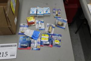 lot 215 image: Lot of (Approximately 14) Gauges and Couplers (in package) - Air Plug 14 FNPT, Brass Coupler, Coupler and Plug Set, Lead Free 100 PSI Pressure Gauge PG1TNL (x3)