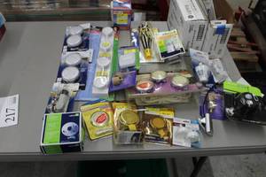 lot 217 image: Lot of LED Lights and Lighting Accessories (in package) - LED Puck Lights, Flameless Candle Lights, Leviton Plastic Lamp Holder, Westek Dimmable Puck Light, Micro Puck Lights, Undercabinet Lights, Wireless Command, And More
