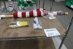 lot 237 image: Lot of (2) American Flag Sets (in package) - Seachoice 12x18 Nylon, Valley Forge 1 White Cast Aluminum Bracket, Sportsman Series 2-12x4 Sleeved Flag with 5 Wood Pole and 2 Position Bracket