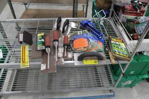 lot 225 image: Lot of Masonry Tools (in package) - Trowels, Multi-Purpose Combs, Blend Pencil, Sanding Blocks, Paint Mixer Paddle, Concrete Mixing Bag, Caulk Gun, And More