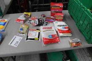 lot 258 image: Lot of Vacuum Accessories (in package) - Eureka Premium Vacuum Bags, Filtrete Vacuum Bags, Hoover Vacuum Belts