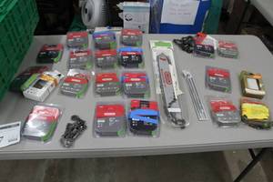 lot 247 image: Lot of Chain Saw Accessories (in package) - Saw Chains, Chain Bars, Bar and Chain Combinations