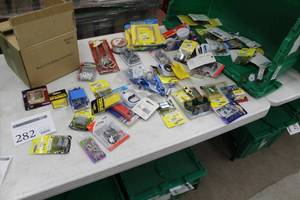 lot 282 image: Lot of Hardware (in package) - Springs, Screws, Clips, Swing Hook Kit, U-Bolt, Low Volt Staples, Couplings, Shear Pins, Misc. Hardware