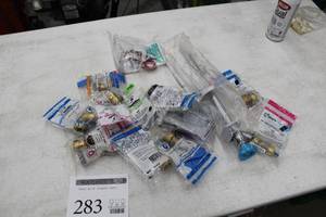 lot 283 image: Lot of Shark Bite Plumbing Parts (in package) - Threaded Adapters, Angle Stop Valve, Sillcock, Misc. Plumbing