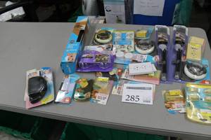 lot 285 image: Lot of Children Safety Supplies (in package) - Safety Belt Pads, Oven Lock, Cabinet Lock, Deadbolt Lock, Window Shades, Misc. Supplies