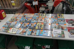 lot 291 image: Lot of DVD Movies, GE Radial CDDVD Cleaning System (in package)