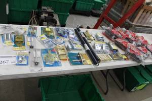 lot 267 image: Lot of Garage Door Parts and Accessories (in package) - Side Lock, Long Stem Heavy Duty Roller, Garage Door Hinges, Garage Door Seals