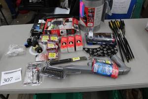 lot 307 image: Lot of Grill Accessories (in package) - Brushes, Charcoal Tube, LED Handle Light, Basting Mop, Ignitor Kit, Grill Covers, Hose and Regulator Sets, Misc. Accessories