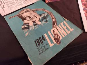 lot 82 image: Lionel Catalogs fron 1964 & 1977, with (2) empty train set boxes