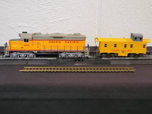 lot 93 image: (1) HO Scale Union Pacific Diesel Engine & Caboose