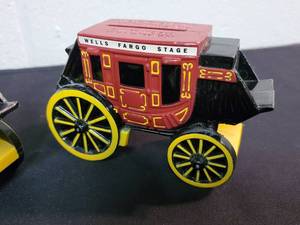 lot 128 image: (3) Retired Wells Fargo Metal Coin Banks