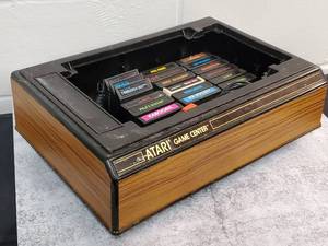 lot 130 image: Atari 2600 Game Controllers & 18 Game Cartridges.