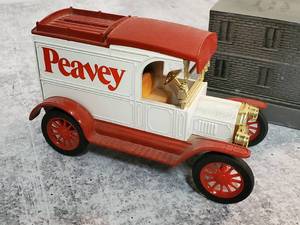 lot 134 image: (2) Ertl Metal Coin Bank Cars & (1) metal Coin Bank