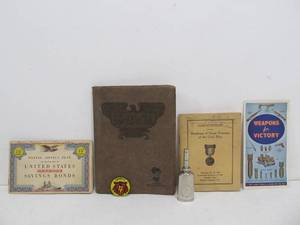 lot 15 image: Group of Vintage WW2 etc Military Books - Button & Gun Oil Can