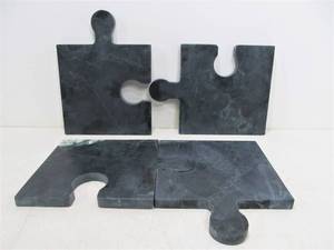 lot 328 image: Heavy Solid Granite Puzzle Pieces