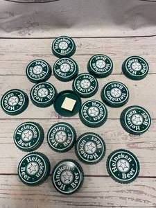 lot 11 image: Lot of 18 Vintage Heineken Beer AdvertisingCaps (new old stock)
