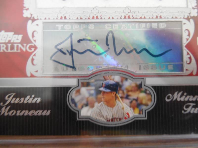lot 121 image: 2007 Topps Sterling Autograph Bat & Jersey Justin Morneau Serial #0410