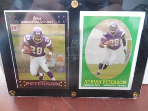 lot 71 image: 2007 Topps Adrian Peterson Rookie Card #301 & Topps Retro Rookie Card #9 LK