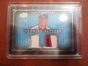 lot 72 image: 2008 UD Premier Patches Justin Morneau Serial #7575 LK