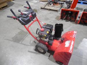 lot 9 image: 24 in. 208 cc Two-Stage Gas Snow Blower with Electric Start Self Propelled