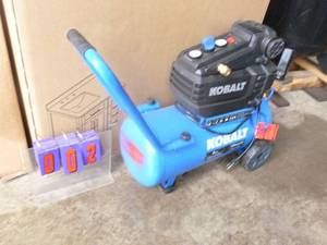 lot 2 image: Kobalt 8 gallon 150 psi air compressor. Nearly new. Tested & works. As shown.