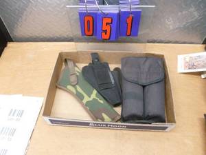 Flat of holsters. As shown.