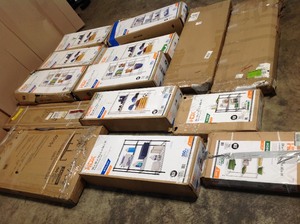 Pallet with assorted storage shelves open boxes see pictures