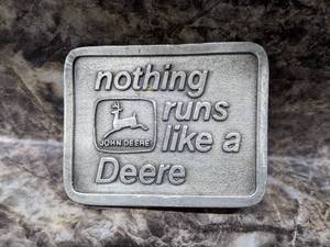 lot 49 image: 1975 Nothing Runs Like A Deere John Deere Belt Buckle