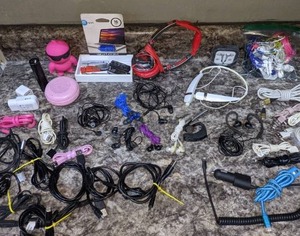 lot 125 image: Phone Charging Cords, Earbuds, Headphones, Etc.