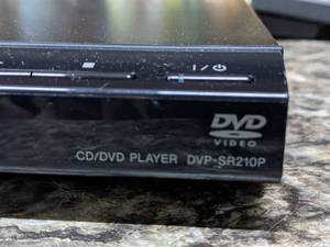 lot 76 image: Sony DVD Player and Kids DVDs