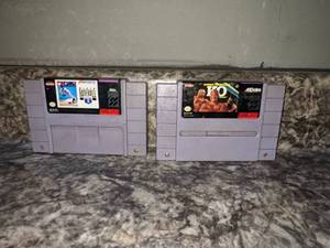 lot 69 image: Super Nintendo SNES MLBPA Baseball & George Foremans KO Games