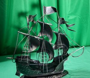 lot 34 image: Tin Conquistador Ship Sculpture
