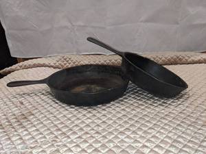 lot 53 image: 8 & 10 12 Cast Iron Skillets